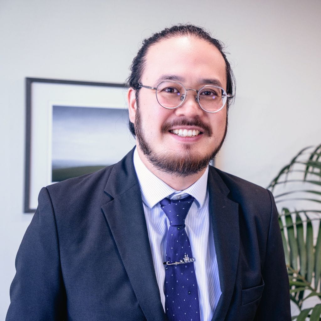 Headshot of Timothy Oo, Senior Associate.